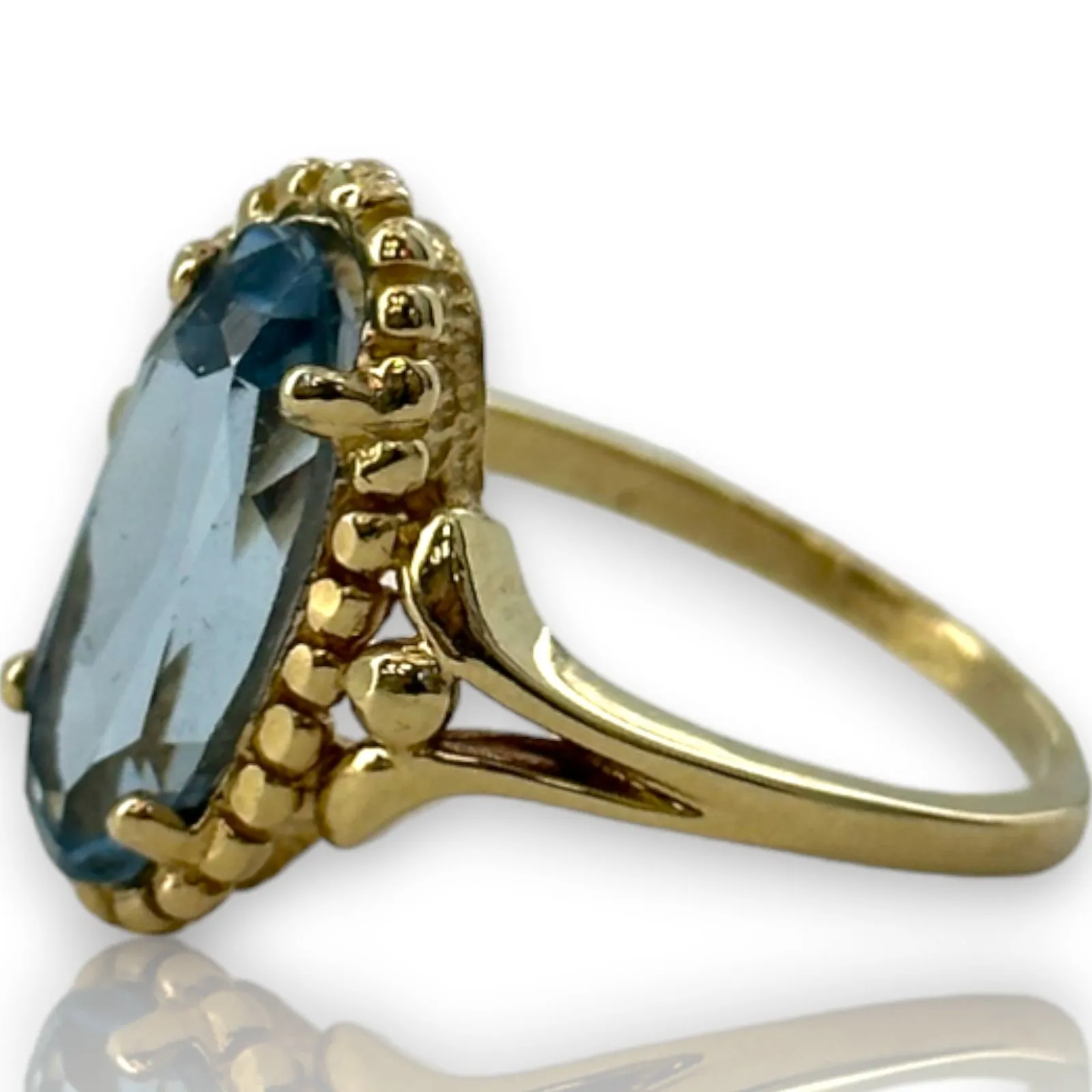 1970-80s Victorian Revival Era Solid 14kt Yellow Gold and Lab Created Blue Spinel Long Oval Solitaire Ring