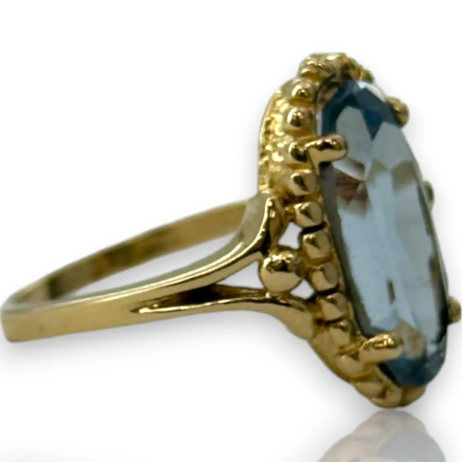 1970-80s Victorian Revival Era Solid 14kt Yellow Gold and Lab Created Blue Spinel Long Oval Solitaire Ring