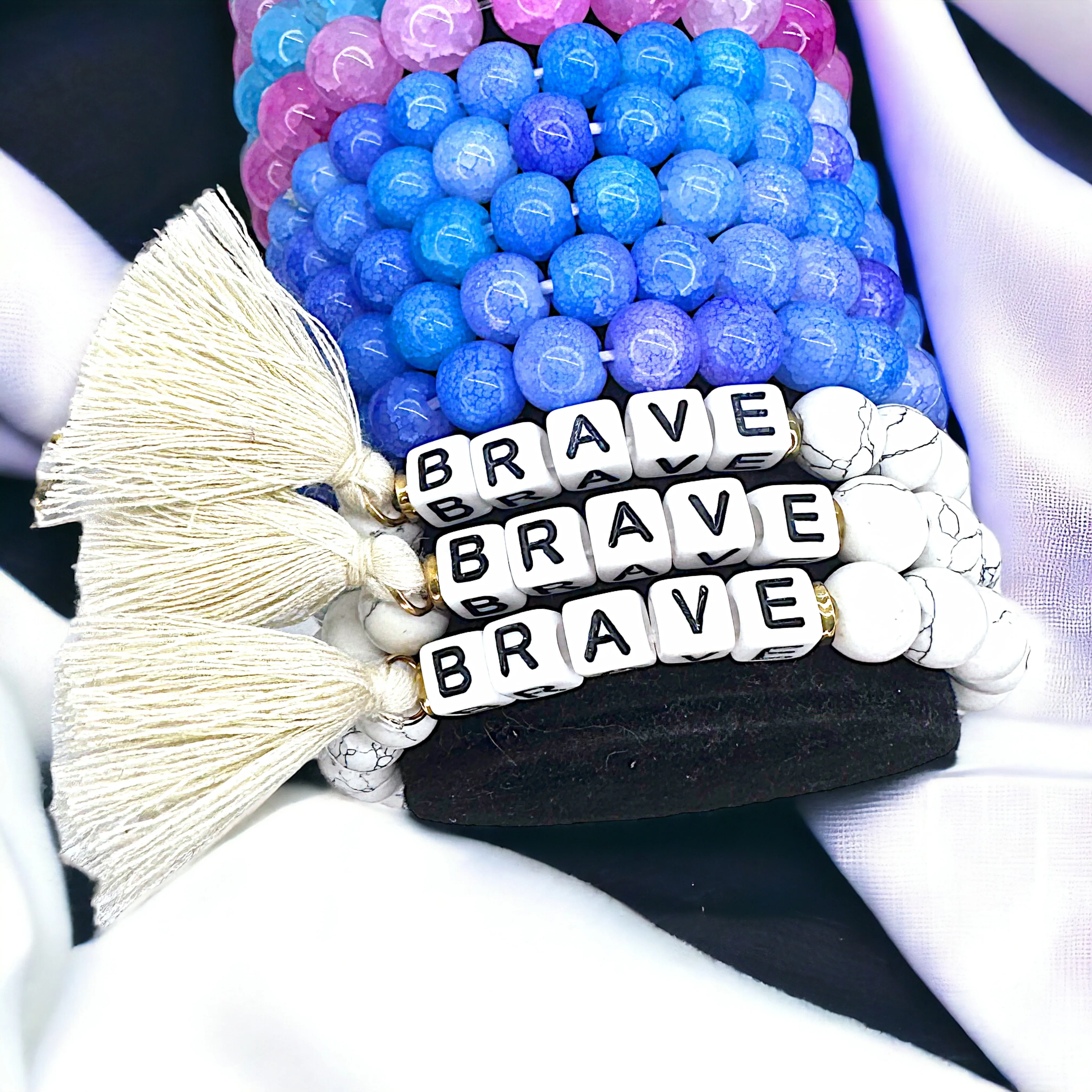 Brand New Tassel Charm “Brave” Beaded Bracelet – Your New Favorite Accessory!